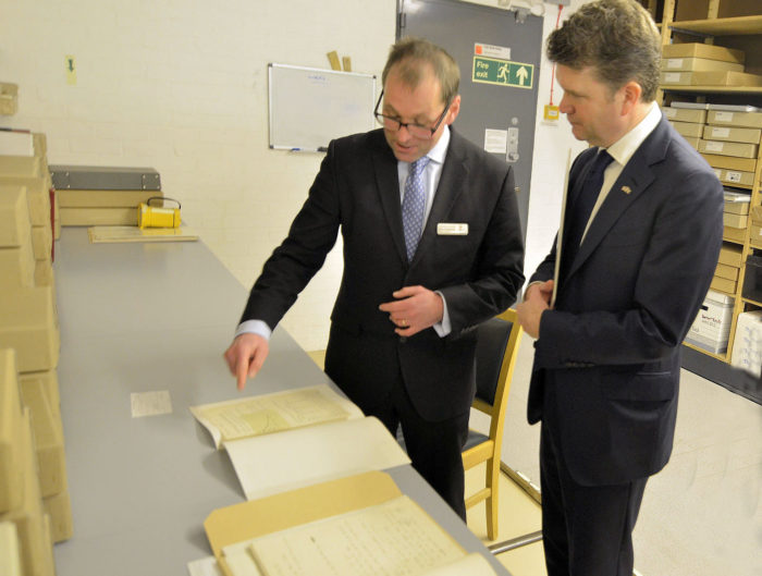 Allen Packwood showing items from the Churchill Collection to the US Ambassador, Matthew Barzun on a recent visit to the Archives Centre.
