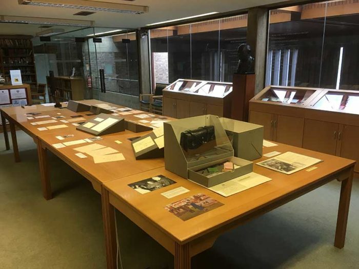 The large table in the centre of the Archives Centre reading room, laid out with a display for the Insight Schools visit. At the end of the table closest to the camera, Margaret Thatcher's black handbag is on show in a display box.