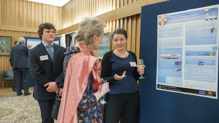 Athene Donald talking to students about their posters at the Shell Churchill Research Prize event