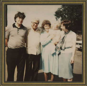 Robert Edwards, Patrick Steptoe and Jean Purdy, standing next to Lesley Brown who is holding baby Louise.