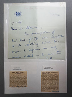 A page from the original scrapbook. Two newspaper clippings and a plastic wallet containing a handwritten letter have been mounted on an A4 sheet of paper
