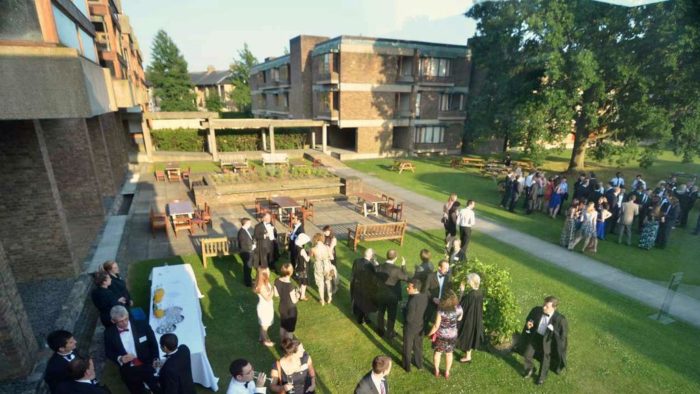 A view from above of a drinks reception in the College grounds