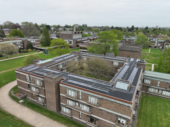 An aerial view of the solar panels on the roof of West Court at Churchill College