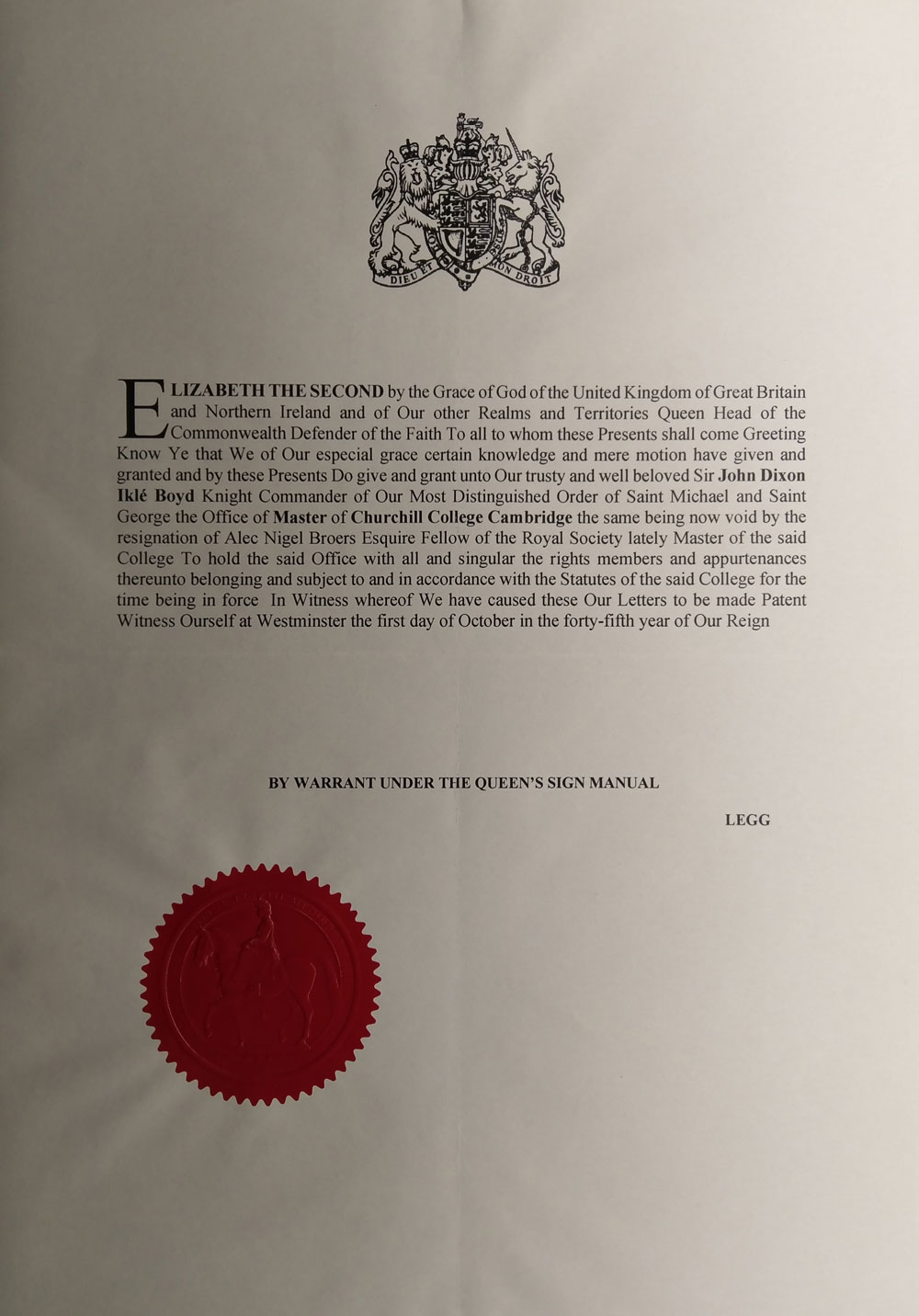 A formal document with a royal coat of arms at the top. The text is official and mentions Elizabeth II, Sir John Dixon Nibley, and the University of Cambridge. A red wax seal is at the bottom left.